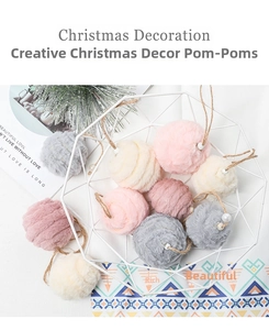 Detailed view of colorful felt pompom Christmas ornaments with pearls in a white basket