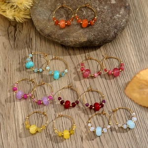 Colorful beaded hoop earrings with gold metal rings in various vibrant color options