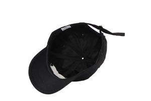 Detail of internal six-panel structure and adjustable metal buckle on black cotton baseball cap