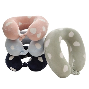 Kids memory foam U-shaped travel neck pillows in pink blue and green polka dot patterns
