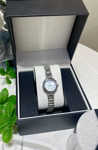 Elegant silver women's watch with pearl dial in a premium black leather gift box