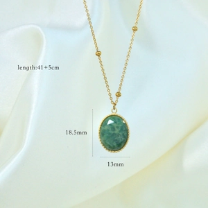 Detail view of 14K gold plated necklace with green stone pendant and size dimensions