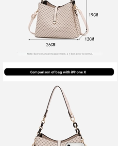 Detail showing dimensions of 26x19x12CM for the khaki bucket bag next to iPhone X