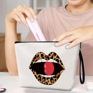 Canvas makeup bag featuring leopard lip print with portable black wristlet and zipper