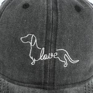 Washed black baseball cap featuring dog silhouette and love embroidery for unisex