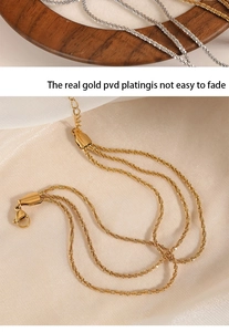 Detailed view of triple-layered PVD gold plated stainless steel necklace with lobster clasp