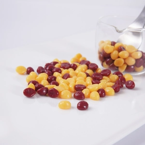 Miniature realistic chestnut models in yellow and dark red for DIY craft food projects