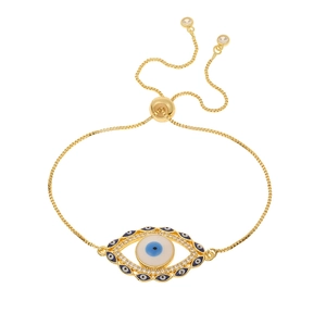 Detail of gold Evil Eye bracelet featuring blue enamel and sparkling crystal accents