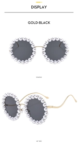 Detail of round sunglasses with pearl-embellished frame and wavy gold metal temples