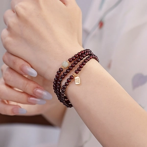 Elegant multi-layer garnet bead bracelet with Hetian jade and golden Fu character charm