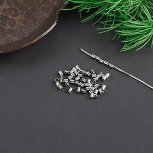 Detail of silver plated anti-slip positioning beads for DIY jewelry making and beading