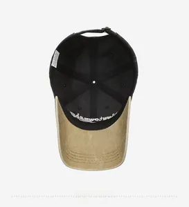 Top view of baseball cap interior showing black cotton sweatband and beige washed brim