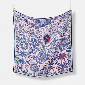 Detail showing pink silk scarf with floral illustration and Isola Di Primavera text
