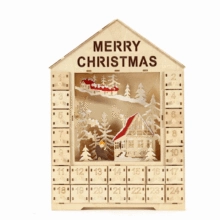 Macro detail of wooden house Advent calendar featuring 24 drawers and LED snow scene decoration