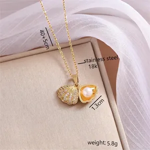 18K gold plated stainless steel necklace with shell fan pendant and white pearl charm