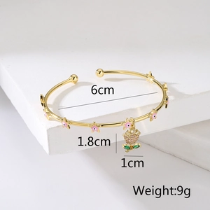 Detail of 18K gold plated bangle with pink stars and zircon flower pendant dimensions