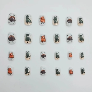 Short square press-on nails set featuring 24pcs cute cartoon dinosaur patterns in multi-color