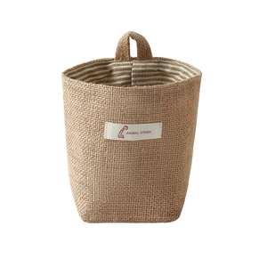 Burlap hanging storage bag with striped lining and loop for wall, door or dorm use.
