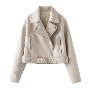 Detail view of beige faux leather biker jacket with silver zippers and waist belt buckle