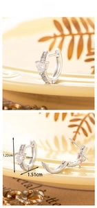 Detail of silver heart zircon earrings showing open hoop design and size dimensions