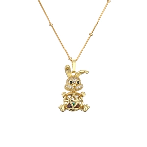 Golden rabbit pendant necklace with sparkling zircons and a gradient gemstone core