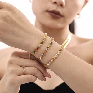 Golden blade necklace and bracelet set with colorful cubic zirconia for women