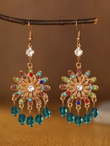 Detailed close-up of Bohemian alloy drop earrings with multicolor rhinestones and blue beads