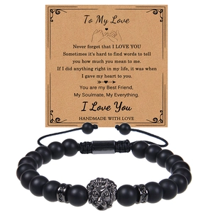 Detail of matte black onyx lion head bracelet with To My Love message card