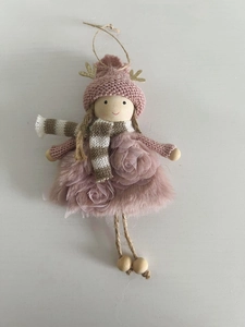 Detailed view of pink Christmas angel ornament with deer horn hat and faux fur skirt