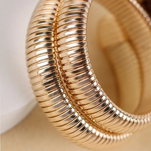 Fashionable gold snake-style wrap bracelet watch with polished flexible metal link design
