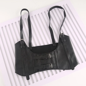 Detail of black punk leather corset belt with double shoulder straps and buckles