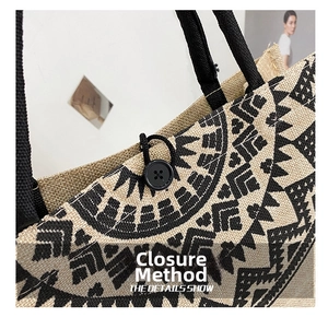Detail view of ethnic jute tote bag with button and elastic loop closure mechanism