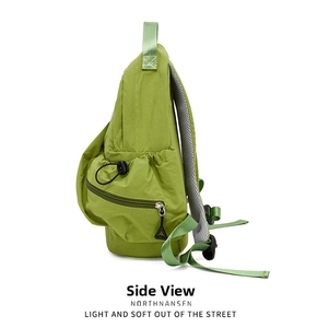 Detailed side view showing the breathable honeycomb mesh back and nylon texture of the backpack