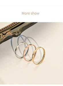 Detail of faceted stackable rings in silver, rose gold and gold finish stainless steel