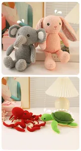 Detail of handmade crochet plush animals including elephant rabbit octopus and turtle toys