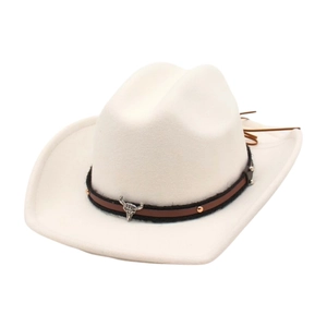 Macro detail of western cowboy hat featuring silver bull skull logo and leather band