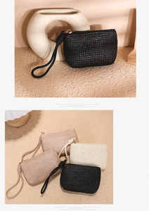 Close-up of woven straw wristlet pouches in multiple colors with textured detail