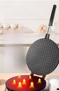 Detail of die-cast aluminum egg roll pan showing high thermal conductivity and grid texture
