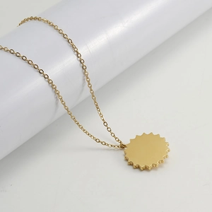 18k gold plated stainless steel necklace featuring a round serrated gear pendant design