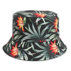 Reversible bucket hat with black base and colorful tropical floral and leaf pattern print