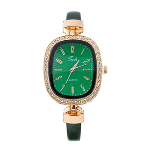 Women's rose gold quartz watch with green dial and crystal-encrusted oval bezel