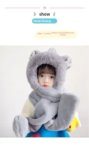 Detail of grey plush hooded scarf with bear ears and paw prints, size 50cm for 4-year-olds