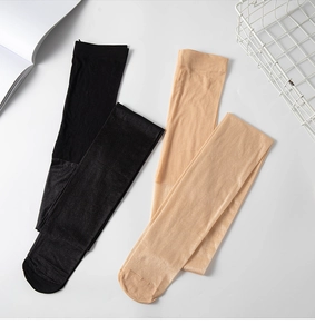 Detail view of 1D ultra-thin glossy sheer pantyhose in black and skin tones