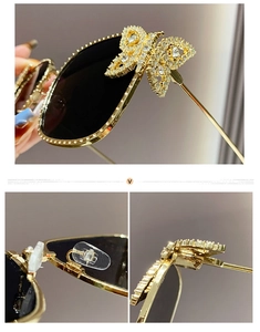 Detailed macro view of rhinestone butterfly hinges and silicone nose pads on sunglasses