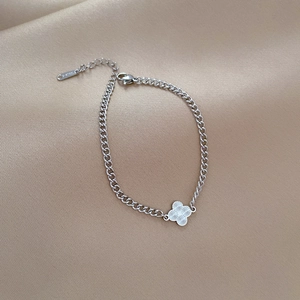 Minimalist silver stainless steel chain bracelet with radiant clover flower pendant