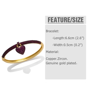 Detailed view of golden heart pendant bracelet with purple zircon and size measurements