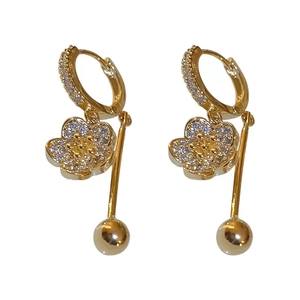 Elegant gold floral drop earrings with white zircon accents and spherical pendants