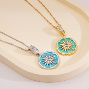 18K gold and silver plated star compass pendants with green enamel and zircons