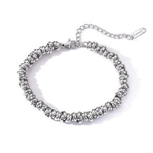 Detailed close-up of a silver stainless steel chunky chain bracelet with lobster clasp