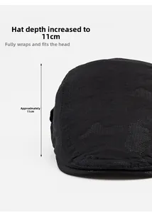 Detail of causal newsboy hat featuring 11cm deep fit and textured breathable fabric
